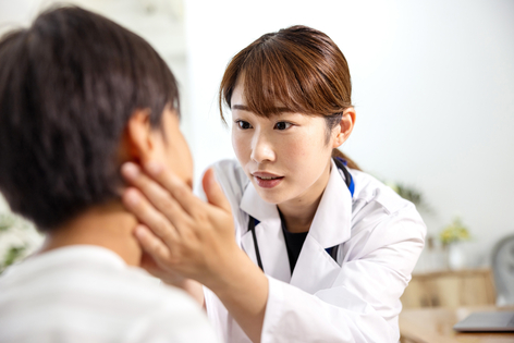 Doctor examines their patient